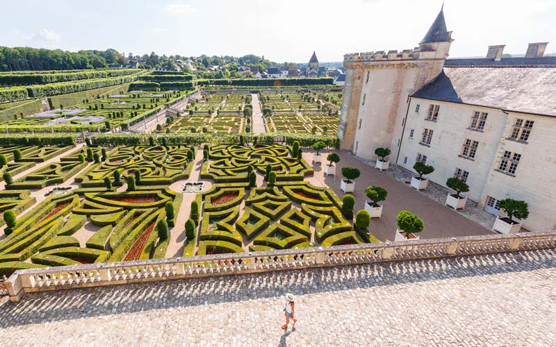 View to the gardens of Villandry castle and its medieval tour, 15 kilometers from Tours. A new bus tour in the south of Paris (France) to learn french history with a travel group. Guide available for a small travel group of english speaking people (from London or America). Villandry is often on the road during a tour around Tours.