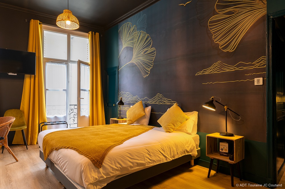A charming room in the Hôtel du Cygne, for a great night.
