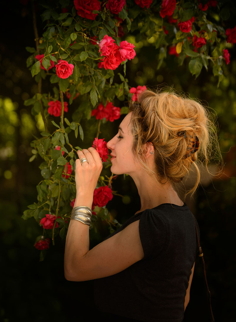 Smelling the delicate perfume of Chédigny roses