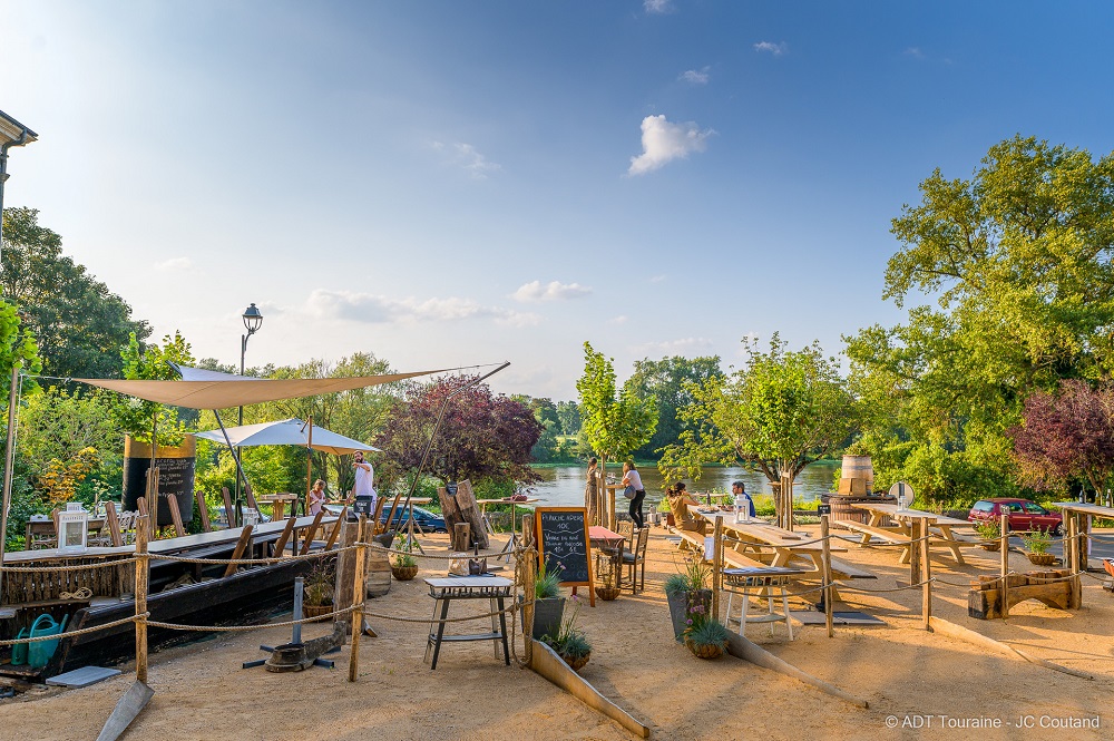 A terrace in front of the River Loire.
